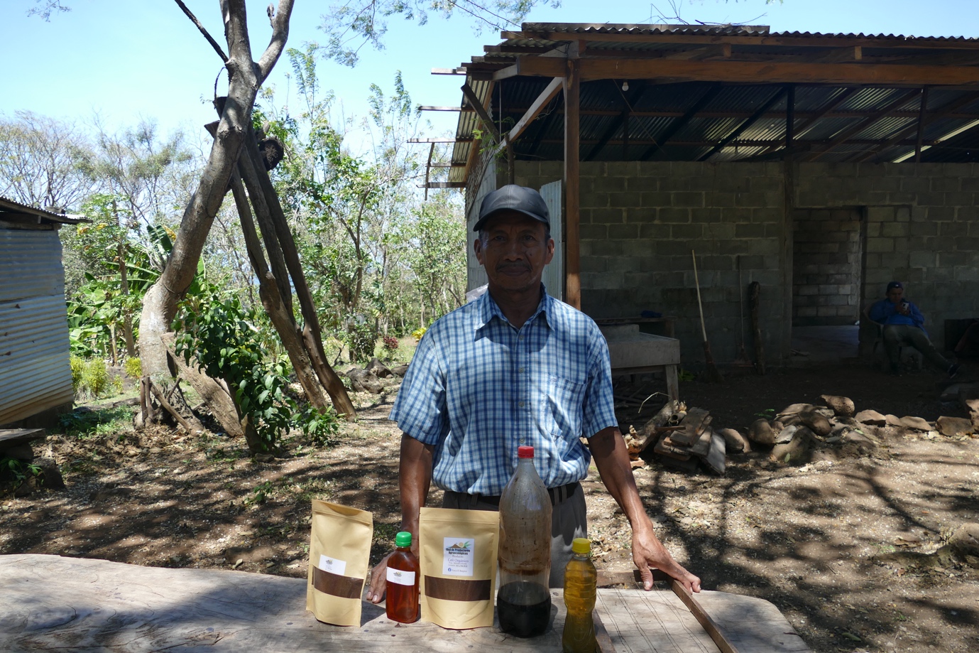 Agroecological farmer Feliciano Alvarez on Ometepe Island with the produce of his farm