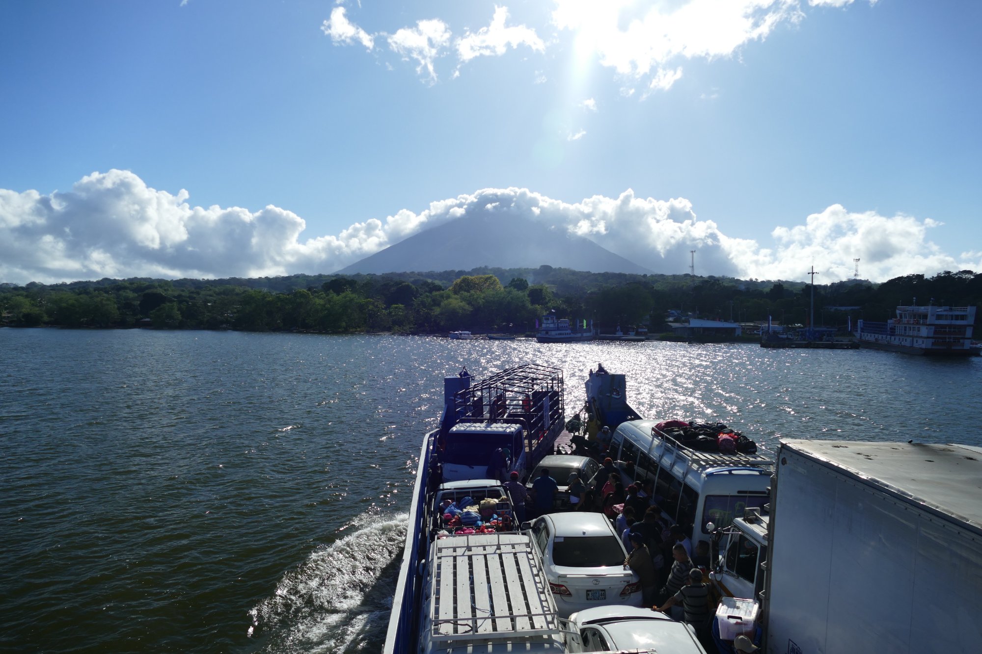 On the ferry approaching Ometepe Island, with Volcán Concepción visible ahead rising from Lake Nicaragua